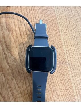 fitbit Versa Series Smartwatch with Slate Blue Silicone Band and charger